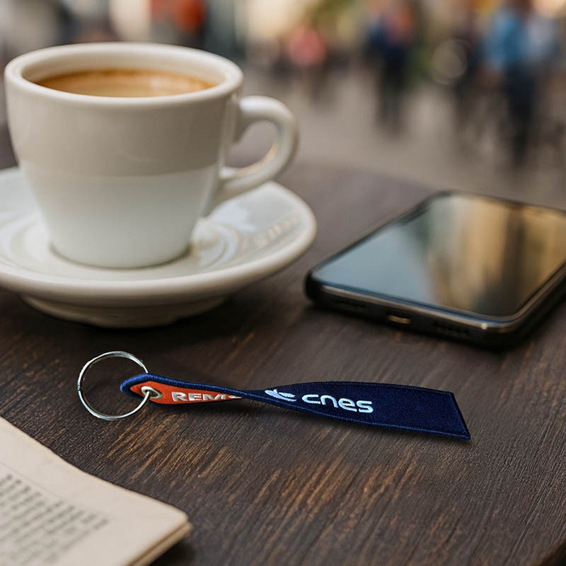 CNES Two-tone Keyring "Remove Before Launch"