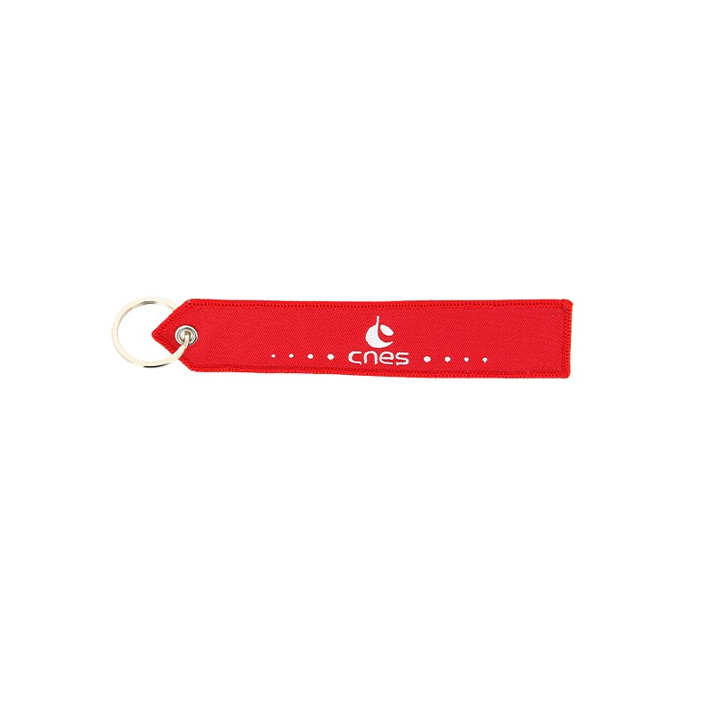 CNES red key ring "Remove before Launch"